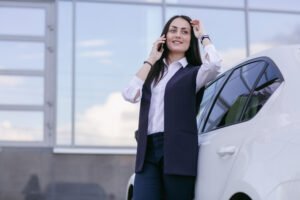 A handshake over car keys, symbolizing trust in Auto Title Loans. Explore our Comprehensive Guide with TFCILOAN for financial insights in Auburn, Alabama."